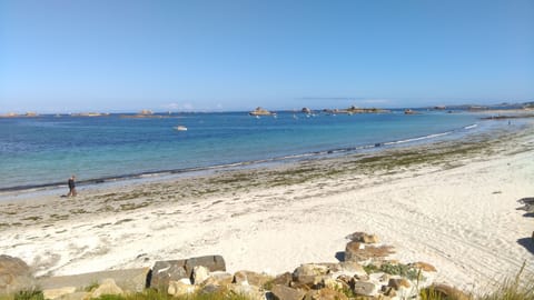 On the beach, sun loungers, beach towels