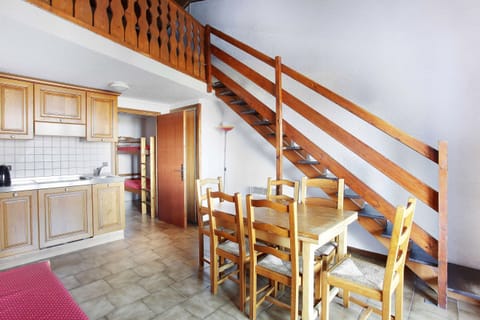 Prepare meals in the kitchenette and enjoy them at the dining table.