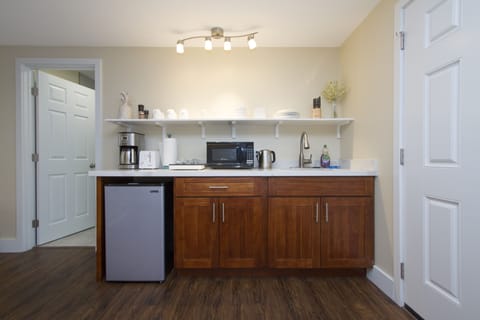 Fridge, microwave, stovetop, coffee/tea maker