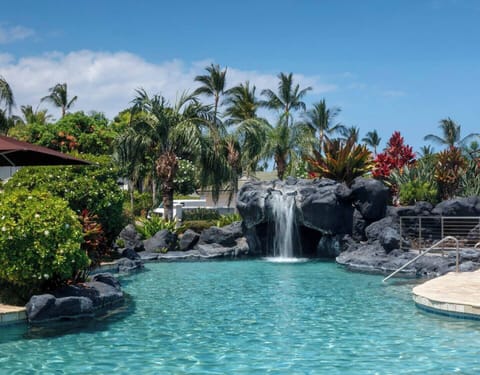 Islands swimming pool with waterfall and grotto.