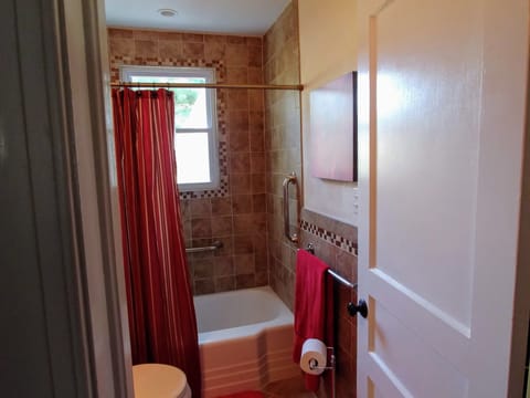 Combined shower/tub, hair dryer, towels, soap