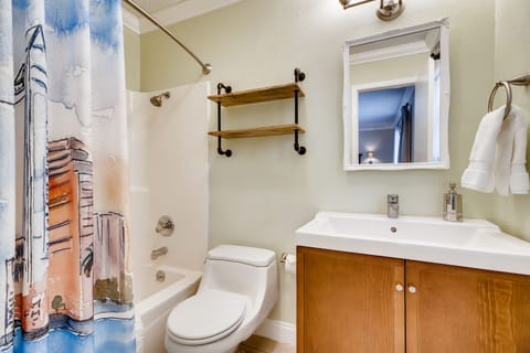 Combined shower/tub, hair dryer, towels, soap