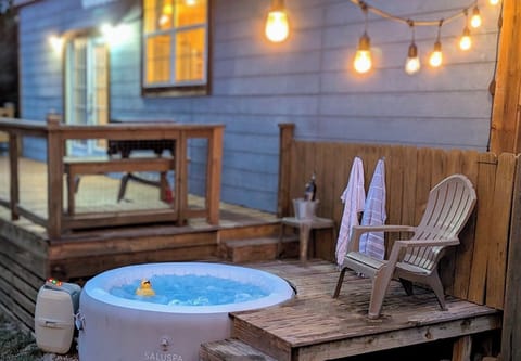 Enjoy an evening under the glow of the string lights in your own private hot tub