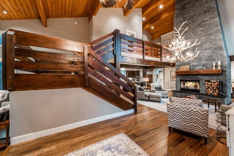 Grand Staircase is Open to Upper & Lower Levels, 5200 Square Feet of Luxury Living, Hard Wood Floors, Custom Furnishings, High End Appliances, Vaulted