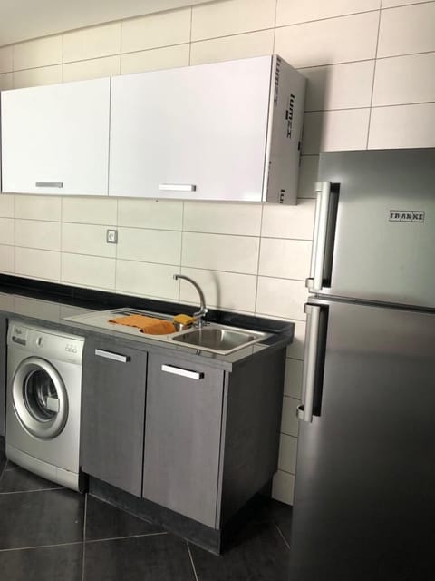 Fridge, oven, electric kettle, cookware/dishes/utensils