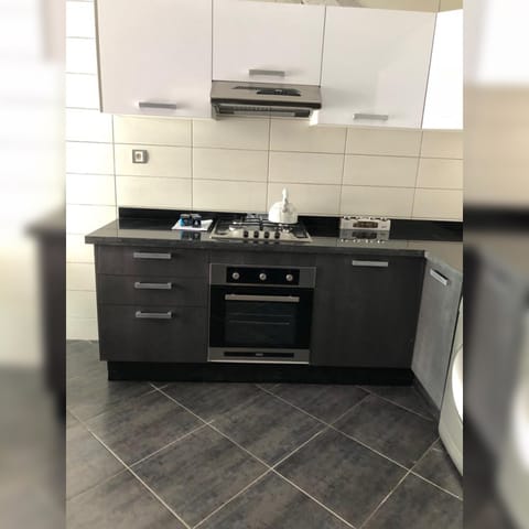 Fridge, oven, electric kettle, cookware/dishes/utensils