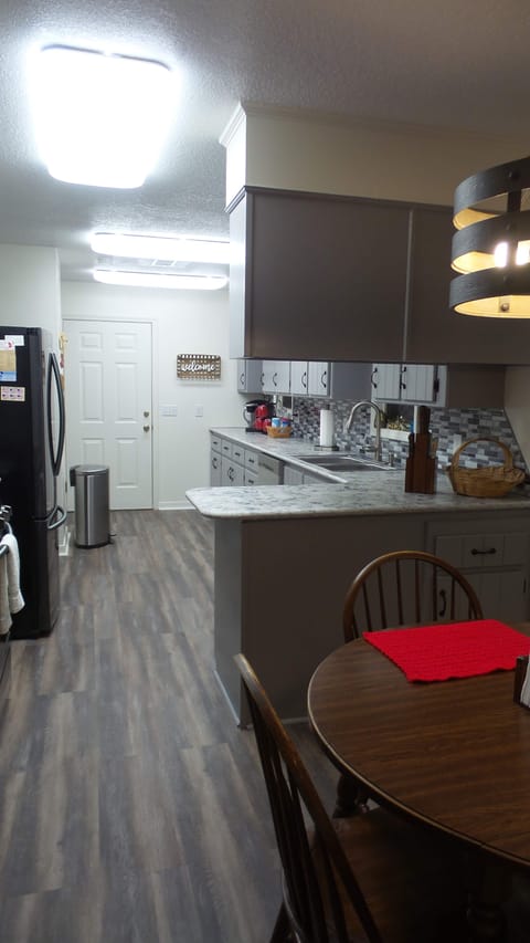 Kitchen looking towards door to garage.