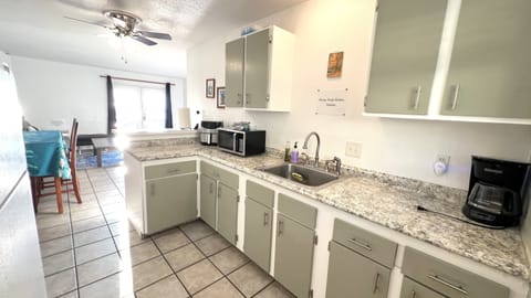 Full kitchen with oven and full size fridge