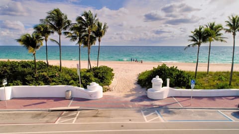 On the beach, sun loungers, beach towels