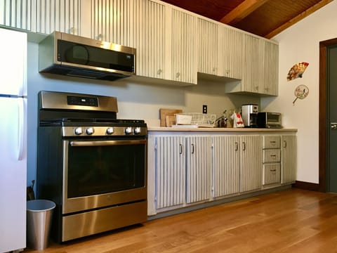 Full kitchen, refrigerator, convection oven, micro, toaster oven, coffee maker