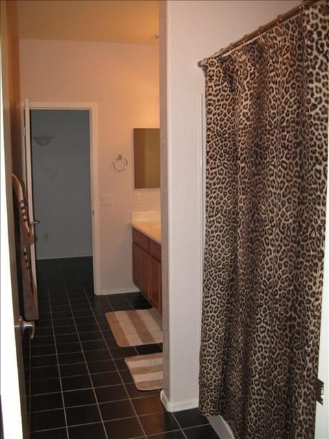 Combined shower/tub, hair dryer, towels, soap