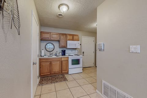 There one step up into the kitchen from the exterior and one step down into the living room area.