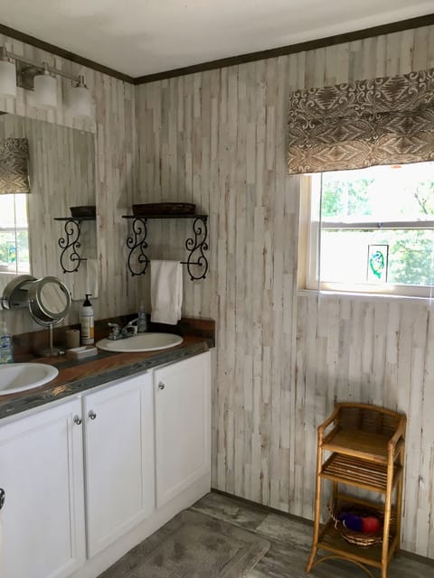 Combined shower/tub, hair dryer, towels, soap