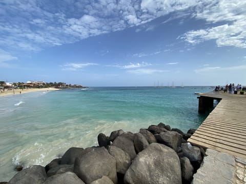 On the beach, sun loungers