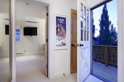 First floor landing with two bedrooms and balcony over the pool area