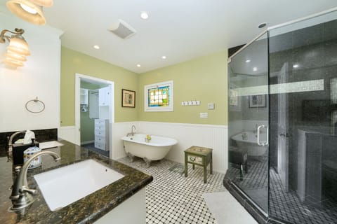 Combined shower/tub, hair dryer, towels, soap