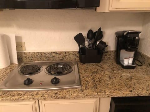 Fridge, microwave, stovetop, coffee/tea maker