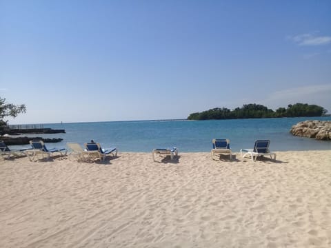 On the beach, sun loungers