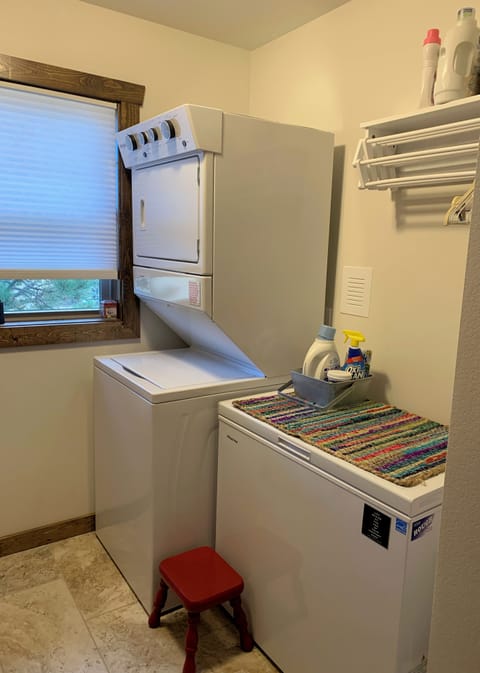 Main-level laundry room w/ washer and dryer