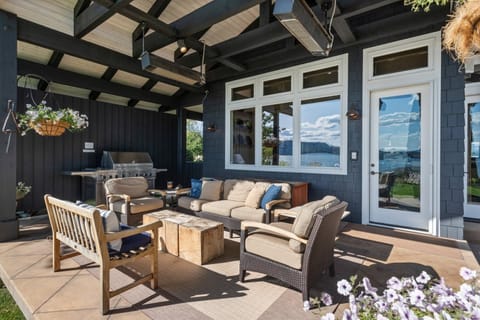 Covered deck with gas BBQ, great seating and when needed, outdoor heaters.