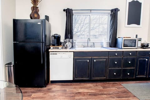 Full-size fridge, microwave, stovetop, coffee/tea maker