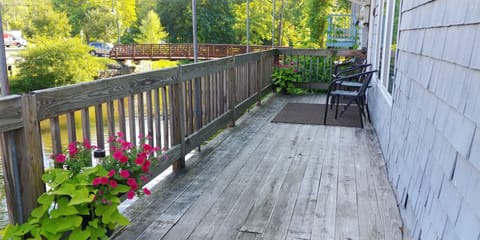 Deck that leads to your door, you can sit outside and watch the ducks.