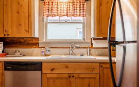 Combined shower/tub, hair dryer, towels, soap