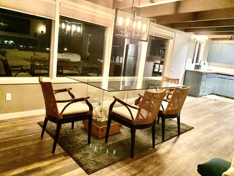 Large glass dining table w/ beautiful coral collection. seats 6 . Ocean views