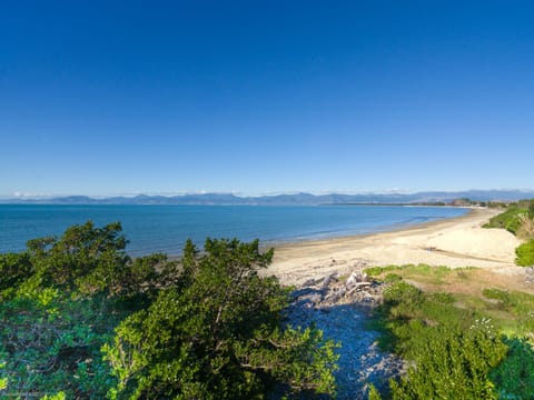 On the beach, sun loungers, beach towels