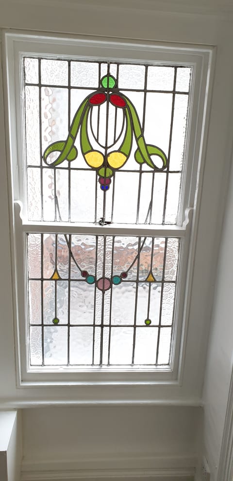 first floor original period Victorian stained glass sash window