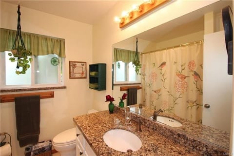 Combined shower/tub, hair dryer, towels, soap