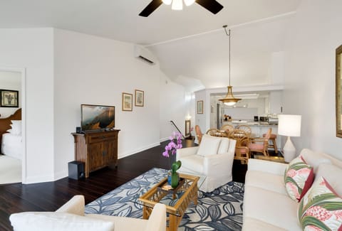 Large living area that flows into the dining room, kitchen and u