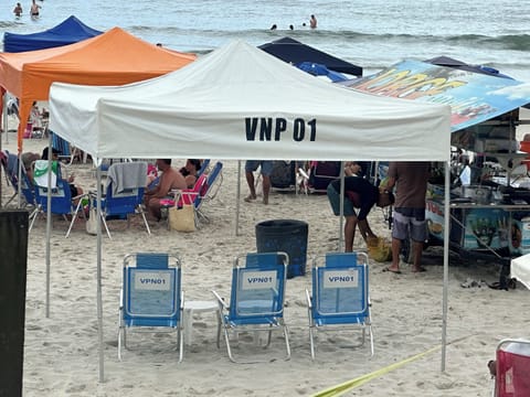 On the beach, sun loungers, beach towels