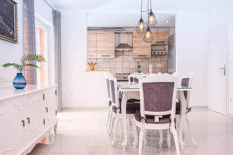 Dining area is connected with fully equipped kitchen.