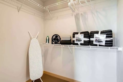 Plenty of extra linens and comforters are included as well as an iron, ironing board, and many essentials. 