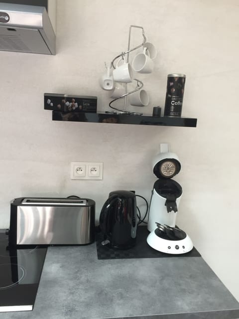 Microwave, coffee/tea maker, cookware/dishes/utensils