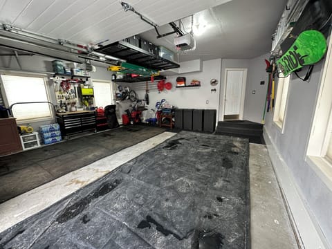 Space for two cars in the garage and 2-3 more outside.