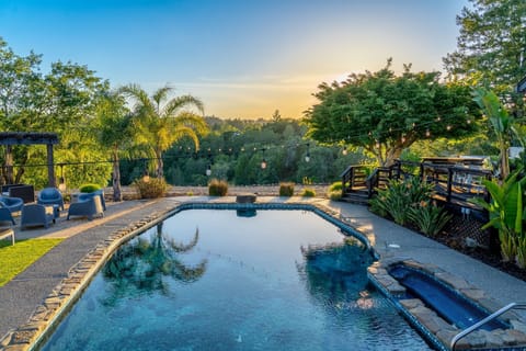 Begin your day with a refreshing swim as the sunrise paints the rolling hills