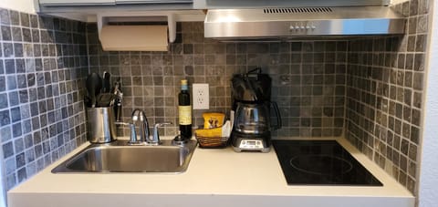 Fridge, microwave, stovetop, coffee/tea maker