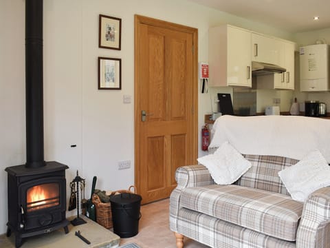 Open plan living space with wood burner | Brooklands Cottage, Bellerby, near Leyburn