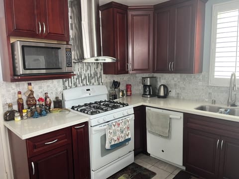 Full Kitchen with Stove top & Oven to prepare your favorite meals