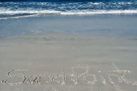 On the beach, sun loungers, beach towels