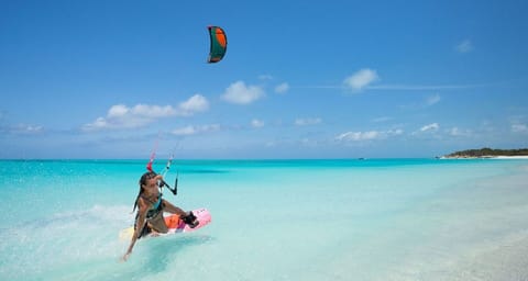 On the beach, sun loungers, beach towels