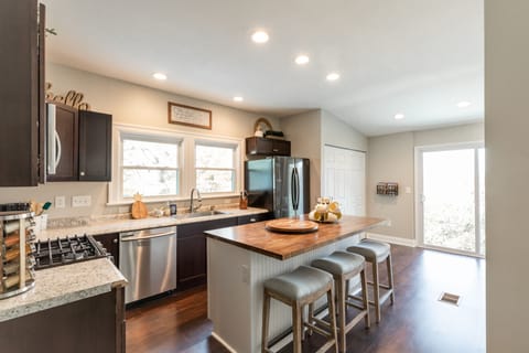 Kitchen is opens up to two level deck. Washer and dryer located in the closet.