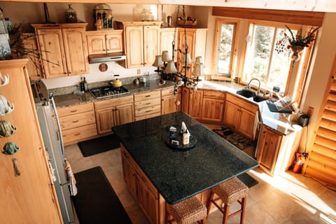 view of kitchen from stair landing
