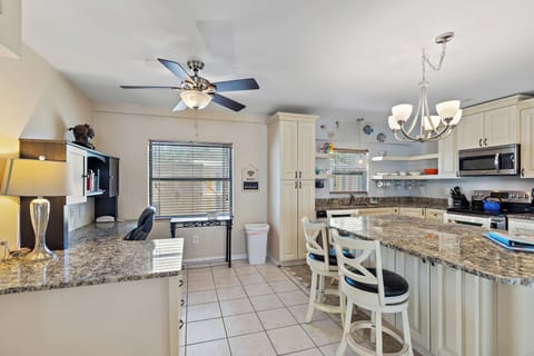 Gorgeous updated kitchen, dining island, and work station!