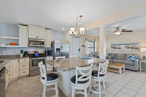 Updated kitchen with island dining area, and living area with pull out couch! 