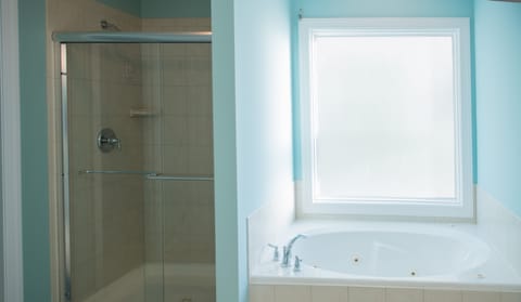 Combined shower/tub, jetted tub