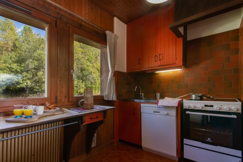 Kitchen with full size oven, dishwasher and a microwave