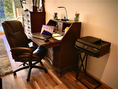 Leather chair and work space with all your remote working supplies